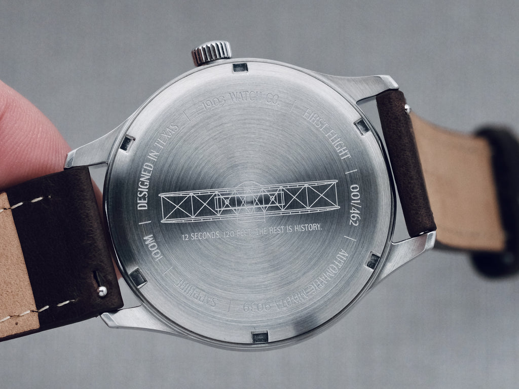 Automatic Watch caseback with Wright Flyer engraving