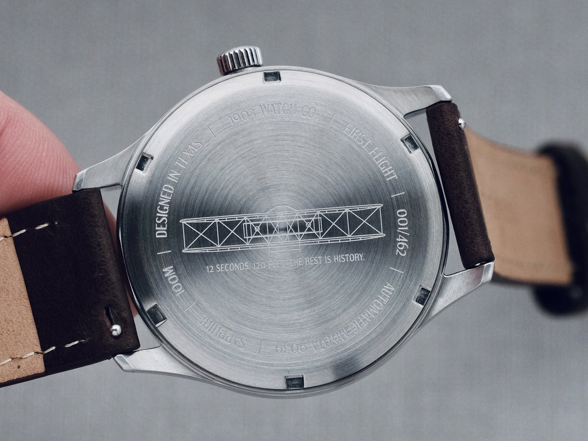 Automatic Watch caseback with Wright Flyer engraving
