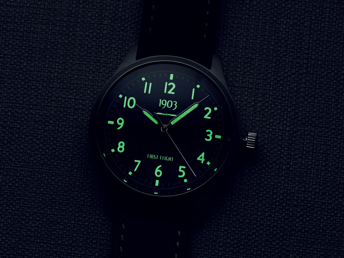 Dark lume shot of automatic watch First Flight 40